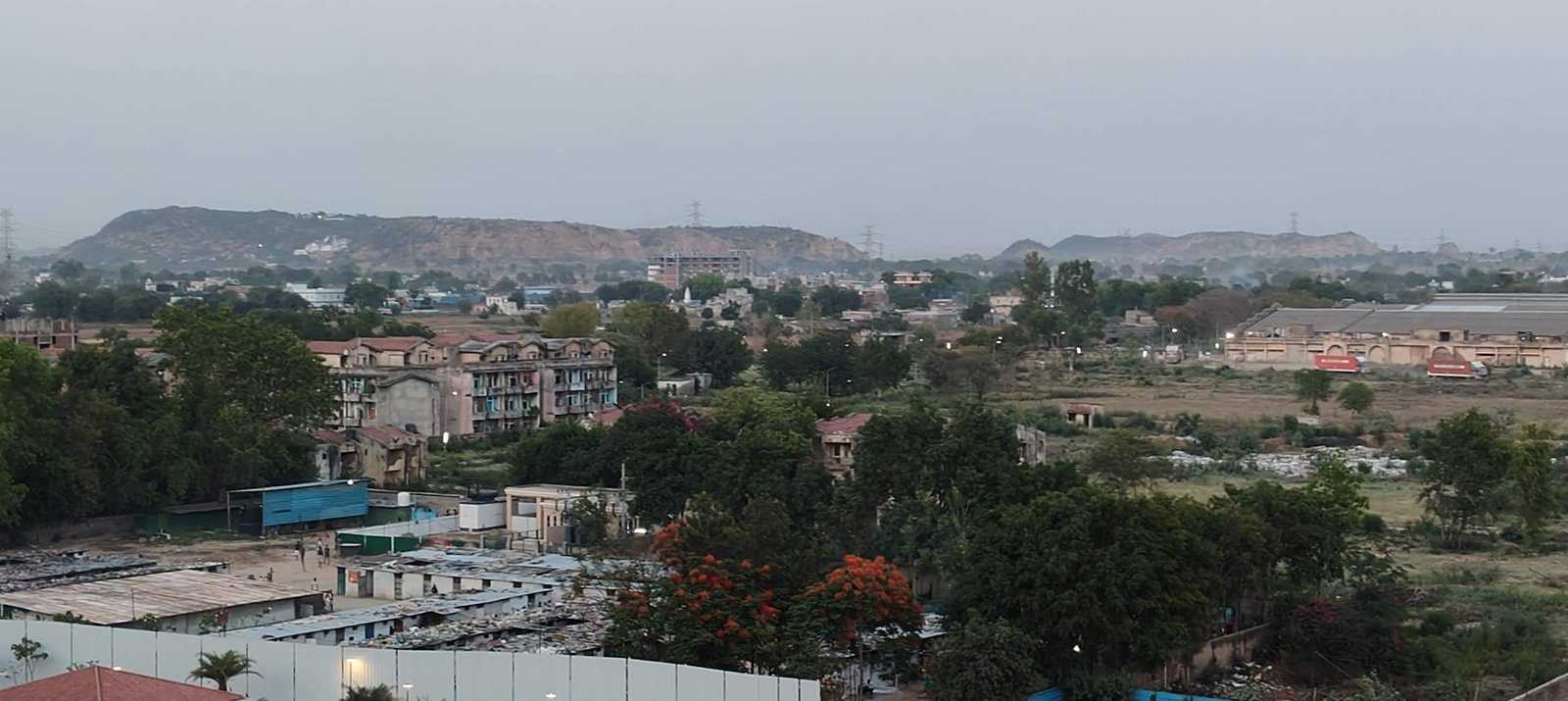 Daytime view of the Aravalli hills from the balcony