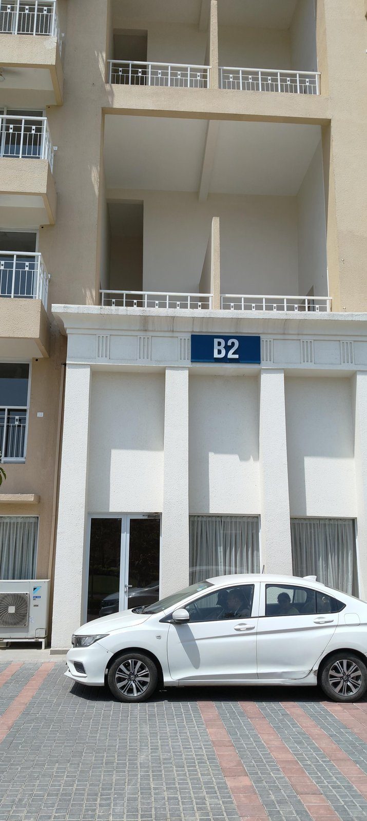 Ashiana Advik entrance signage and landscaping