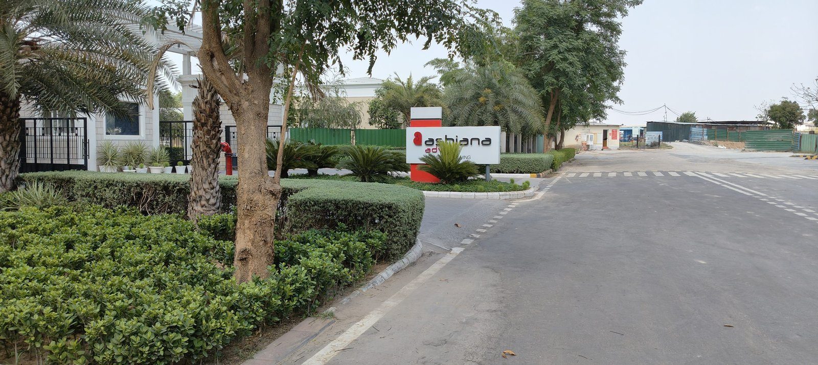 The clubhouse exterior with gardens and benches